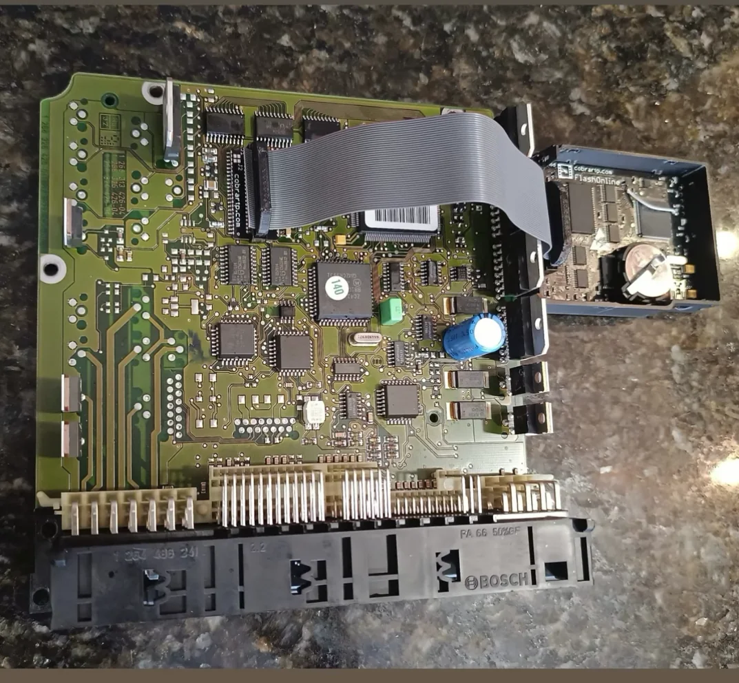 The project's Bosch ME2.1 ECU fitted with a CobraRTP FlashOnline board